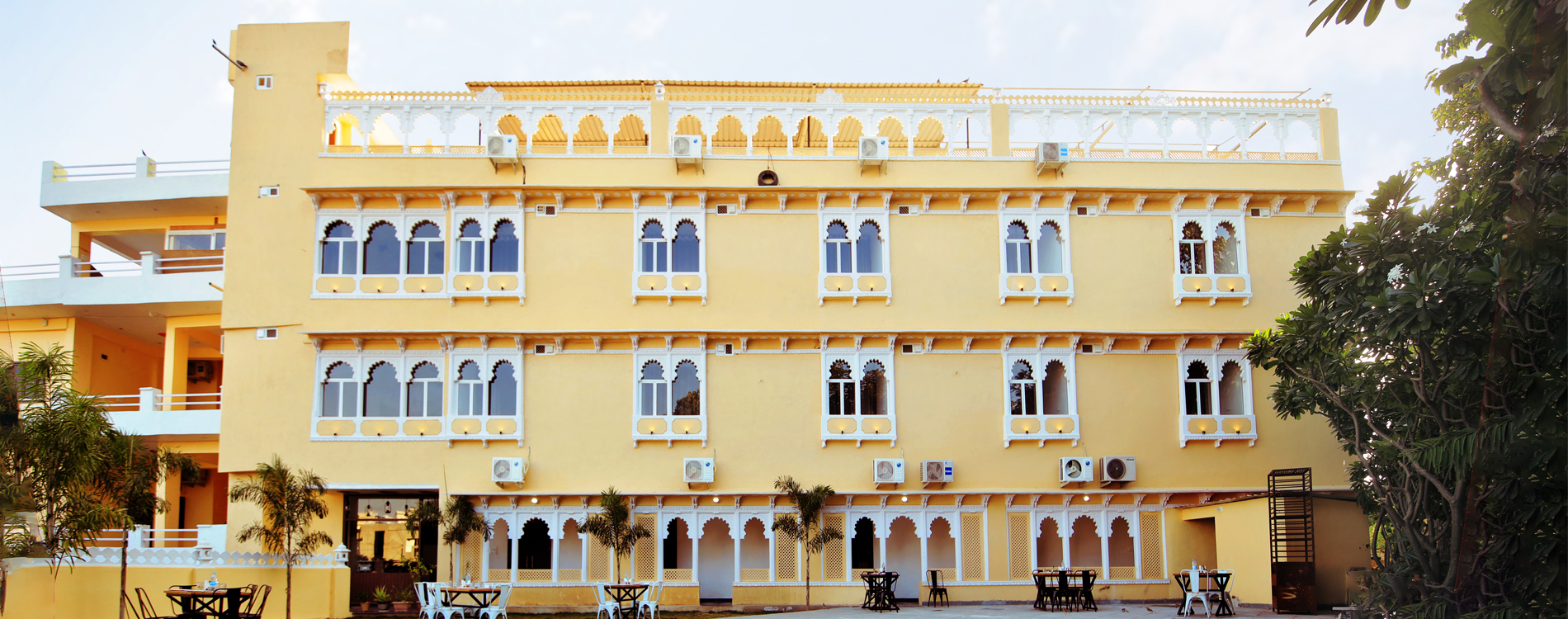 The Sajjangarh Resort Udaipur exterior with scenic Aravalli view